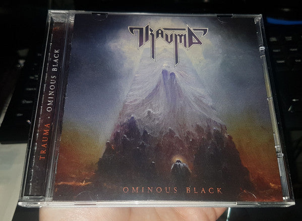 Trauma (10) : Ominous Black (CD, Album, O-C)
